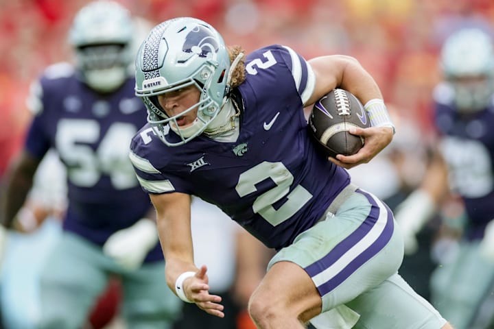 Kansas State quarterback Avery Johnson scores a touchdown during the Aer Lingus Classic between Iowa State and Kansas State a