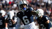 Penn State wide receiver Trey Wallace checks in with a line judge in the first half of an NCAA football game in Beaver Stadium, Saturday, Nov. 2, 2024, in State College, Pa.