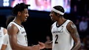 Vanderbilt’s A.J. Hoggard (11) and M.J. Collins Jr. (2) celebrate after defeating Texas in a NCAA college basketball game Saturday, Feb. 8, 2025, in Nashville, Tenn. Vanderbilt won 86-78.
