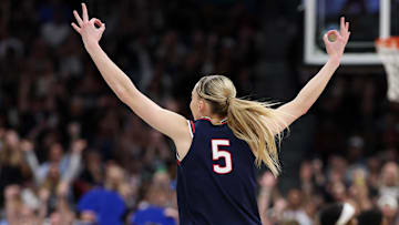 Connecticut Huskies guard Paige Bueckers celebrates a three-point basket against the South Carolina Gamecocks during the second half of the national championship of the women's 2025 NCAA tournament at Amalie Arena. 