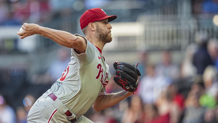 Aug 20, 2024; Cumberland, Georgia, USA; Philadelphia Phillies starting pitcher Zack Wheeler (45) pitches against the Atlanta Braves during the first inning at Truist Park.