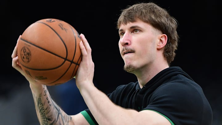 Mar 22, 2026; Boston, Massachusetts, USA;  Boston Celtics guard Baylor Scheierman (55) shoots the ball during warmups prior to a game against the Minnesota Timberwolves at TD Garden. Mandatory Credit: Bob DeChiara-Imagn Images