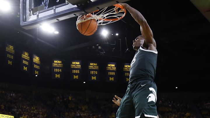 Mar 8, 2026; Ann Arbor, Michigan, USA;  Michigan State Spartans forward Coen Carr (55) dunks in the second half against the Michigan Wolverines at Crisler Center. Mandatory Credit: Rick Osentoski-Imagn Images