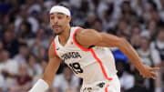 Aug 2, 2024; Villeneuve-d'Ascq, France; Canada point guard Andrew Nembhard (19) controls the ball against Spain in the second half in a men’s group A basketball game during the Paris 2024 Olympic Summer Games at Stade Pierre-Mauroy. Mandatory Credit: John David Mercer-USA TODAY Sports