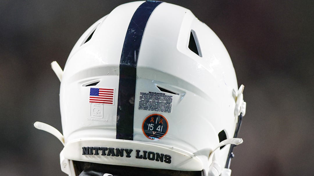 Nov 19, 2022; Piscataway, New Jersey, USA; A Penn State Nittany Lions helmet is seen with a sticker honoring the Virginia football players who were victims of a shooting on the University of Virginia campus, on November thirteenth 2022, during the second half against the Rutgers Scarlet Knights at SHI Stadium. 
