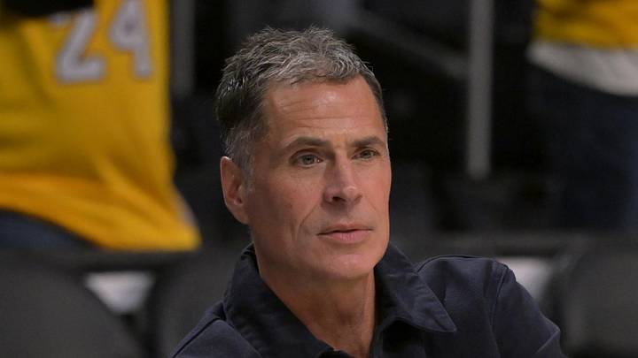 Nov 21, 2024; Los Angeles, California, USA;  Los Angeles Lakers general manager Rob Pelinka, right, talks with Leroy Sims, director of player performance & health, prior to the game against the Orlando Magic at Crypto.com Arena. Mandatory Credit: Jayne Kamin-Oncea-Imagn Images