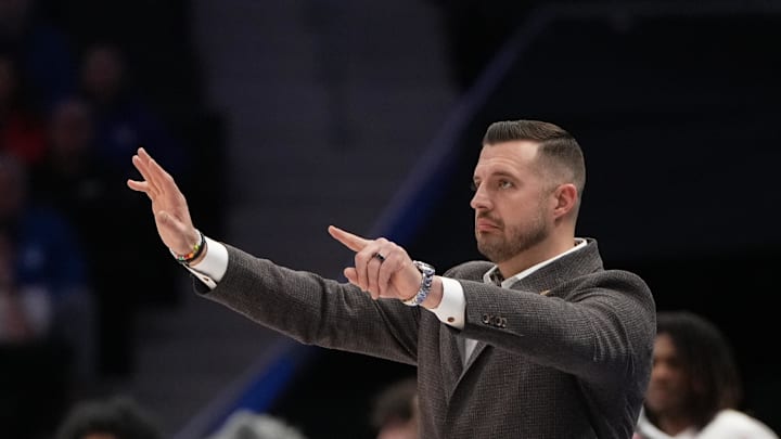 Mar 12, 2026; Charlotte, NC, USA; Florida State Seminoles head coach Luke Loucks in the first half at Spectrum Center. Mandatory Credit: Bob Donnan-Imagn Images