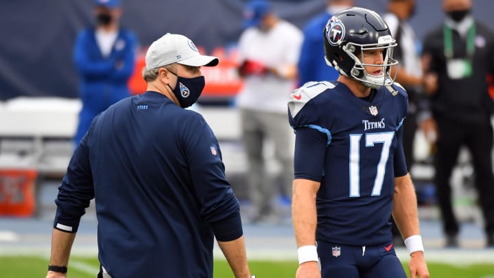 Oct 18, 2020; Nashville, Tennessee, USA; Tennessee Titans offensive coordinator Arthur Smith talks with quarterback Ryan Tannehill (17) before a game against the Houston Texans at Nissan Stadium. Mandatory Credit: Christopher Hanewinckel-USA TODAY Sports