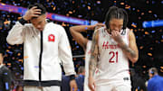 Apr 7, 2025; San Antonio, TX, USA; Houston Cougars guard Emanuel Sharp (21) and teammates walk off the court after losing to the Florida Gators in the national championship game of the Final Four of the 2025 NCAA Tournament at the Alamodome. Mandatory Credit: Robert Deutsch-Imagn Images