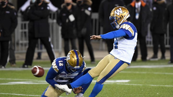 Dec 12, 2021; Hamilton, Ontario, CAN;  Winnipeg Blue Bombers kicker Sergio Castillo (14) kicks a field goal against the Hamilton Tiger-Cats during the 108th Grey Cup football game at Tim Hortons Field. Mandatory Credit: Dan Hamilton-USA TODAY Sports