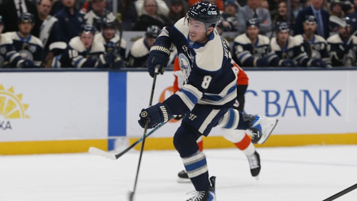 Jan 28, 2026; Columbus, Ohio, USA; Columbus Blue Jackets defenseman Zach Werenski (8) wrists a shot on goal against the Philadelphia Flyers during the second period at Nationwide Arena. Mandatory Credit: Russell LaBounty-Imagn Images