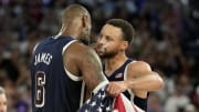 Aug 10, 2024: United States shooting guard Steph Curry and guard LeBron James celebrate after defeating France in the men's basketball gold medal game during the Paris 2024 Olympic Summer Games at Accor Arena.