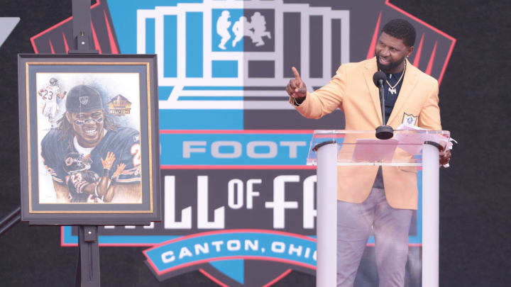 Devin Hester gives his remarks at the Pro Football Hall of Fame Enshrinement, Saturday, Aug. 3, 2024, in Canton.