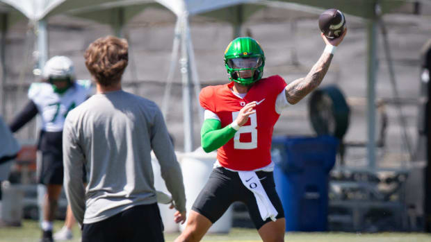 Oregon quarterback Dillon Gabriel throws out a pass during practice with the Ducks 