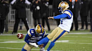 Dec 12, 2021; Hamilton, Ontario, CAN;  Winnipeg Blue Bombers kicker Sergio Castillo (14) kicks a field goal against the Hamilton Tiger-Cats during the 108th Grey Cup football game at Tim Hortons Field. Mandatory Credit: Dan Hamilton-Imagn Images