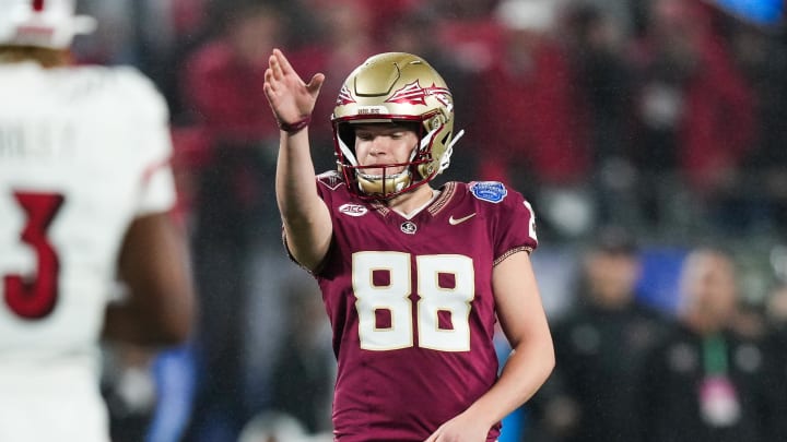 Dec 2, 2023; Charlotte, NC, USA; Florida State Seminoles place kicker Ryan Fitzgerald (88) lines up a field goal during the fourth quarter against the Louisville Cardinals at Bank of America Stadium. Mandatory Credit: Jim Dedmon-USA TODAY Sports