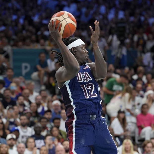 United States guard Jrue Holiday (12) passes in the first quarter against Serbia during the Paris 2024 Olympic Summer Games.