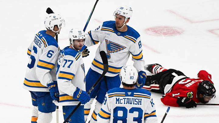 Oct 6, 2026; Chicago, Illinois, USA;  St. Louis Blues left wing Connor McMichael (77) celebrates with teammates after scoring a goal during the third period against the Chicago Blackhawks  at United Center.  Mandatory Credit: Matt Marton-Imagn Images