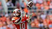 Aug 31, 2024; Stillwater, Oklahoma, USA; Oklahoma State Cowboys wide receiver Rashod Owens (10) reaches for a pass during the third quarter against the South Dakota State Jackrabbits at Boone Pickens Stadium. Mandatory Credit: William Purnell-Imagn Images