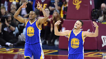 Jun 10, 2016; Cleveland, OH, USA; Golden State Warriors guard Stephen Curry (30) and forward Andre Iguodala (9) celebrate after a three point basket against the Cleveland Cavaliers during the fourth quarter in game four of the NBA Finals at Quicken Loans Arena. Mandatory Credit: Ken Blaze-Imagn Images