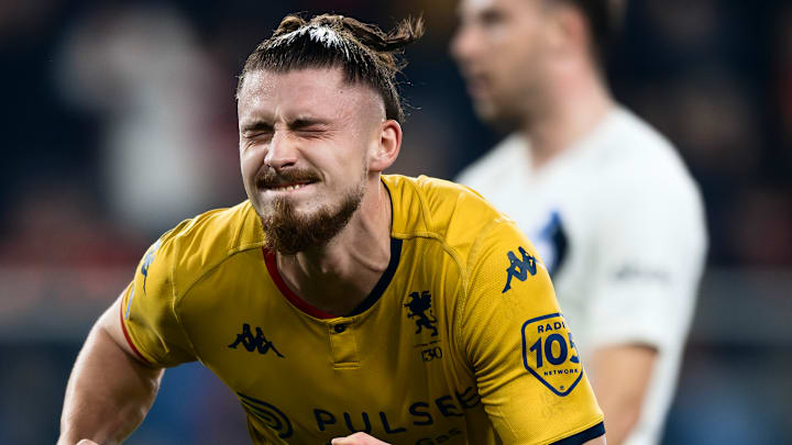 Radu Dragusin (L) of Genoa CFC celebrates after scoring a...