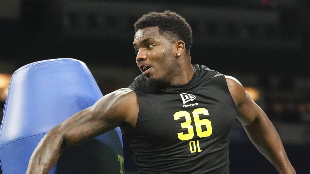 Penn State defensive lineman Dani Dennis-Sutton goes through drills at the Scouting Combine.