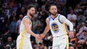 Apr 26, 2023; Sacramento, California, USA; Golden State Warriors guard Stephen Curry (30) is congratulated by guard Klay Thompson (11) after making a basket against the Sacramento Kings in the fourth quarter during game five of the 2023 NBA playoffs at the Golden 1 Center. Mandatory Credit: Cary Edmondson-USA TODAY Sports
