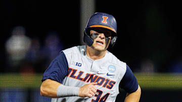 May 31, 2024; Lexington, KY, USA; Illinois Fighting Illini infielder Drake Westcott (34) runs to third base during the eighth inning against the Indiana State Sycamores at Kentucky Proud Park. Mandatory Credit: Jordan Prather-Imagn Images