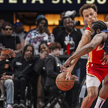 Mar 14, 2025; Atlanta, Georgia, USA; Atlanta Hawks guard Dyson Daniels (5) steals the ball from LA Clippers guard James Harden (1) during the first half at State Farm Arena. Mandatory Credit: Dale Zanine-Imagn Images