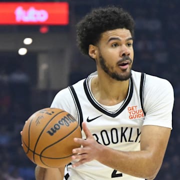 Mar 11, 2025; Cleveland, Ohio, USA; Brooklyn Nets forward Cameron Johnson (2) looks to pass in the first quarter against the Cleveland Cavaliers at Rocket Arena. Mandatory Credit: David Richard-Imagn Images