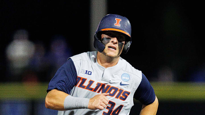 May 31, 2024; Lexington, KY, USA; Illinois Fighting Illini infielder Drake Westcott (34) runs to third base during the eighth inning against the Indiana State Sycamores at Kentucky Proud Park. Mandatory Credit: Jordan Prather-Imagn Images