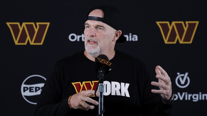 Jul 25, 2024; Ashburn, VA, USA; Washington Commanders head coach Dan Quinn speaks with the media on day two of training camp at OrthoVirginia Training Center at Commanders Park. Mandatory Credit: Geoff Burke-USA TODAY Sports