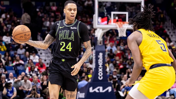 Mar 1, 2024; New Orleans, Louisiana, USA;  New Orleans Pelicans guard Jordan Hawkins (24) dribbles