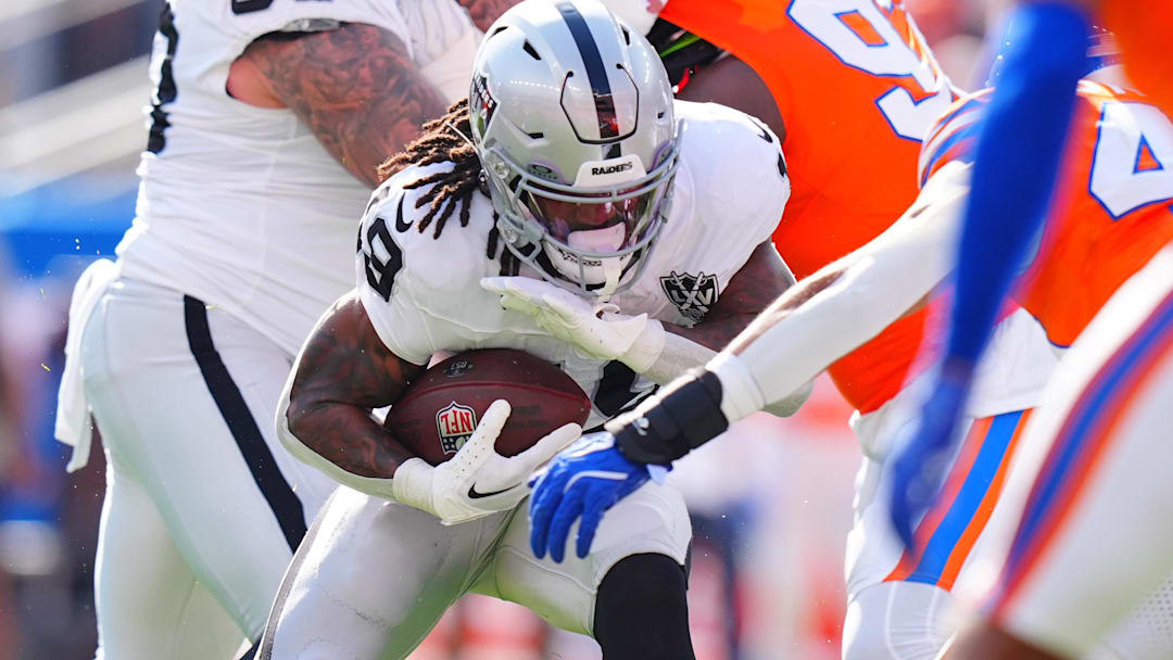 Oct 6, 2024; Denver, Colorado, USA; Las Vegas Raiders running back Sincere McCormick (28) during the second quarter against the Denver Broncos at Empower Field at Mile High. Mandatory Credit: Ron Chenoy-Imagn Images