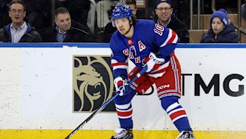 Dec 9, 2024; New York, New York, USA; New York Rangers left wing Artemi Panarin (10) controls the puck against the Chicago Blackhawks during the third period at Madison Square Garden. Mandatory Credit: Brad Penner-Imagn Images