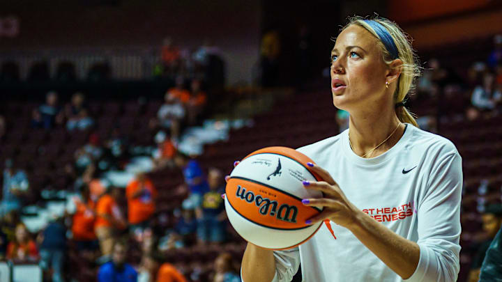 Indiana Fever guard Sophie Cunningham warms up before the start of the game against the Connecticut Sun. Indiana Fever guard Sophie Cunningham warms up before the start of the game against the Connecticut Sun.