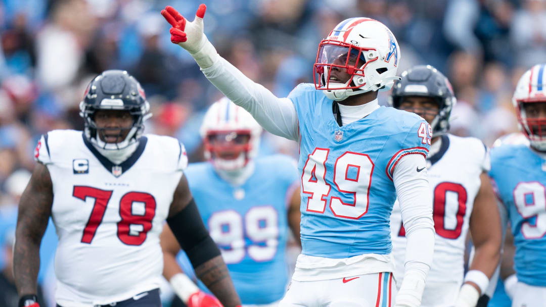 Tennessee Titans linebacker Arden Key (49) helps the referees with a Houston Texans penalty during their game at Nissan Stadium in Nashville, Tenn., Sunday, Dec. 17, 2023.