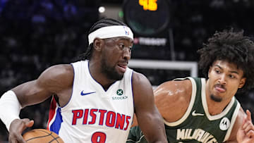 Detroit Pistons guard Caris Levert drives against Milwaukee Bucks center Jericho Sims.