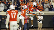 Oct 18, 2025; Charlottesville, Virginia, USA; Virginia Cavaliers defensive back Ja'Son Prevard (10) celebrates with Cavaliers defensive back Donavon Platt (28) after intercepting a pass against the Washington State Cougars in the fourth quarter at Scott Stadium. Mandatory Credit: Geoff Burke-Imagn Images