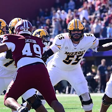 Oct 12, 2024; Amherst, Massachusetts, USA; Missouri Tigers offensive lineman Connor Tollison (55) blocks during the first half against the Massachusetts Minutemen at Warren McGuirk Alumni Stadium. Mandatory Credit: Eric Canha-Imagn Images
