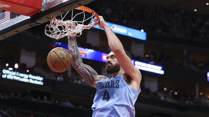 Oct 21, 2022; Houston, Texas, USA; Memphis Grizzlies center Steven Adams (4) dunks the ball during the second quarter against the Houston Rockets at Toyota Center. Mandatory Credit: Troy Taormina-USA TODAY Sports