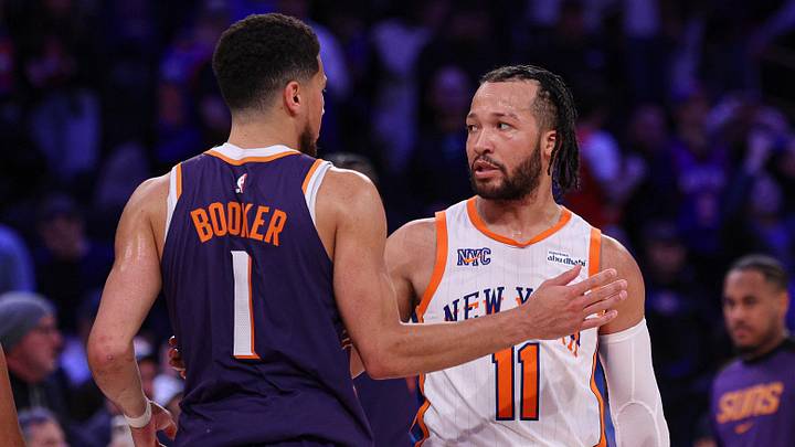 Apr 6, 2025; New York, New York, USA; New York Knicks guard Jalen Brunson (11) greets Phoenix Suns guard Devin Booker (1) after the game at Madison Square Garden. Mandatory Credit: Vincent Carchietta-Imagn Images