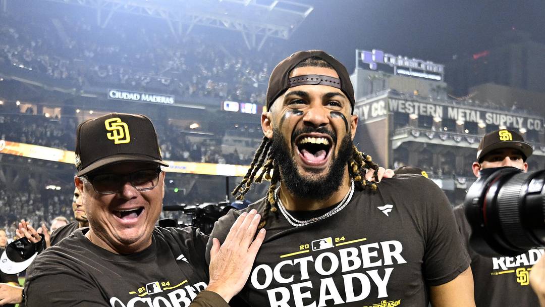Oct 2, 2024; San Diego, California, USA; San Diego Padres manager Mike Shildt (8) and third baseman Manny Machado (13) celebrate after winning the Wildcard round for the 2024 MLB Playoffs against the Atlanta Braves at Petco Park. Mandatory Credit: Denis Poroy-Imagn Images Oct 2, 2024; San Diego, California, USA; San Diego Padres manager Mike Shildt (8) and third baseman Manny Machado (13) celebrate after winning the Wildcard round for the 2024 MLB Playoffs against the Atlanta Braves at Petco Park. Mandatory Credit: Denis Poroy-Imagn Images