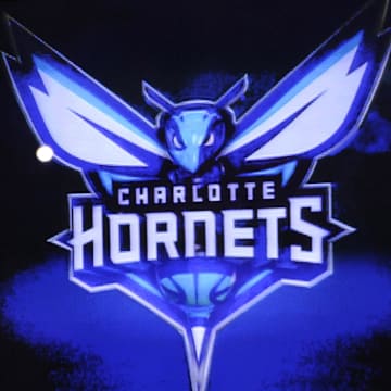 Dec 21, 2013; Charlotte, NC, USA; The Charlotte Bobcats unveil their new branding logo as the Charlotte Hornets for the 2014 season at halftime during the game against the Utah Jazz at Time Warner Cable Arena. Mandatory Credit: Sam Sharpe-Imagn Images