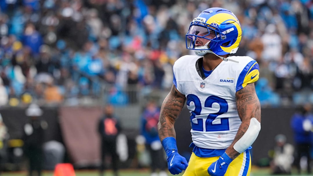 Nov 30, 2025; Charlotte, North Carolina, USA; Los Angeles Rams running back Blake Corum (22) celebrates after scoring a touchdown during the second quarter against the Carolina Panthers at Bank of America Stadium. Mandatory Credit: Jim Dedmon-Imagn Images Nov 30, 2025; Charlotte, North Carolina, USA; Los Angeles Rams running back Blake Corum (22) celebrates after scoring a touchdown during the second quarter against the Carolina Panthers at Bank of America Stadium. Mandatory Credit: Jim Dedmon-Imagn Images