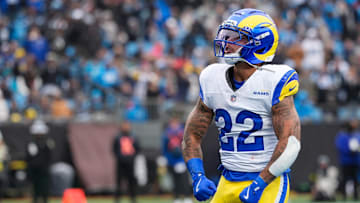 Nov 30, 2025; Charlotte, North Carolina, USA; Los Angeles Rams running back Blake Corum (22) celebrates after scoring a touchdown during the second quarter against the Carolina Panthers at Bank of America Stadium. Mandatory Credit: Jim Dedmon-Imagn Images
