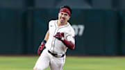 Aug 19, 2025; Phoenix, Arizona, USA; Arizona Diamondbacks outfielder Corbin Carroll runs to third after hitting an RBI triple in the fifth inning against the Cleveland Guardians at Chase Field. Mandatory Credit: Mark J. Rebilas-Imagn Images