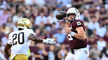 Aug 31, 2024; College Station, Texas, USA; Texas A&M Aggies quarterback Conner Weigman (15) looks to pass the ball during the first half against the Notre Dame Fighting Irish at Kyle Field. Mandatory Credit: Maria Lysaker-Imagn Images