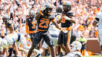 Tennessee defensive back Boo Carter (23) celebrates after sacking Chattanooga quarterback Chase Artopoeus (9) during Tennessee's game against Chattanooga in Neyland Stadium in Knoxville on Saturday, Aug. 31, 2024.