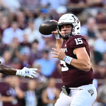 Aug 31, 2024; College Station, Texas, USA; Texas A&M Aggies quarterback Conner Weigman (15) looks to pass the ball during the first half against the Notre Dame Fighting Irish at Kyle Field. Mandatory Credit: Maria Lysaker-USA TODAY Sports